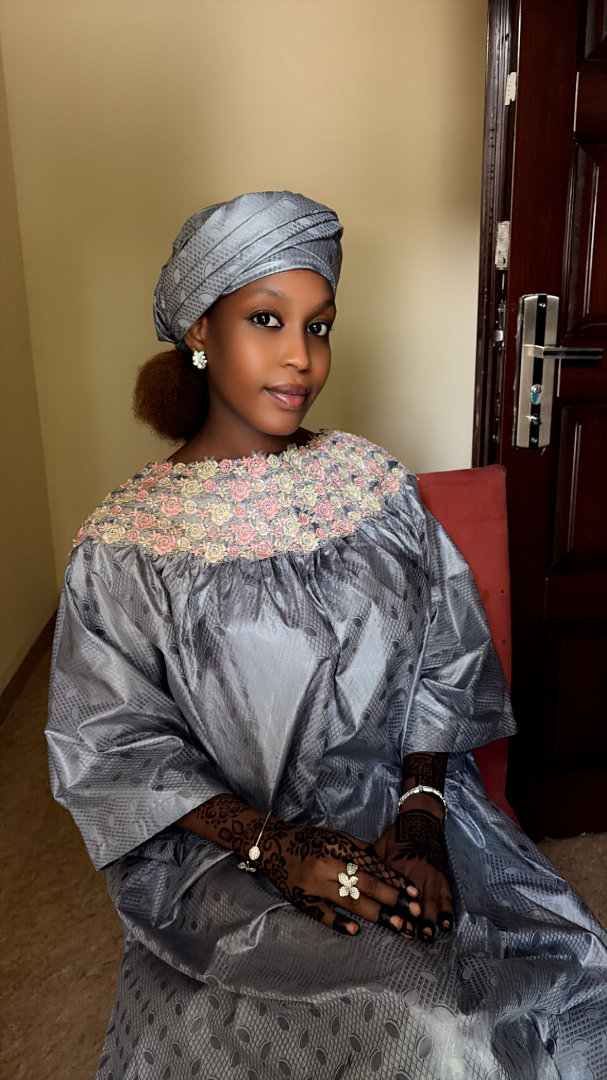 Indo wearing an elegant silver outfit